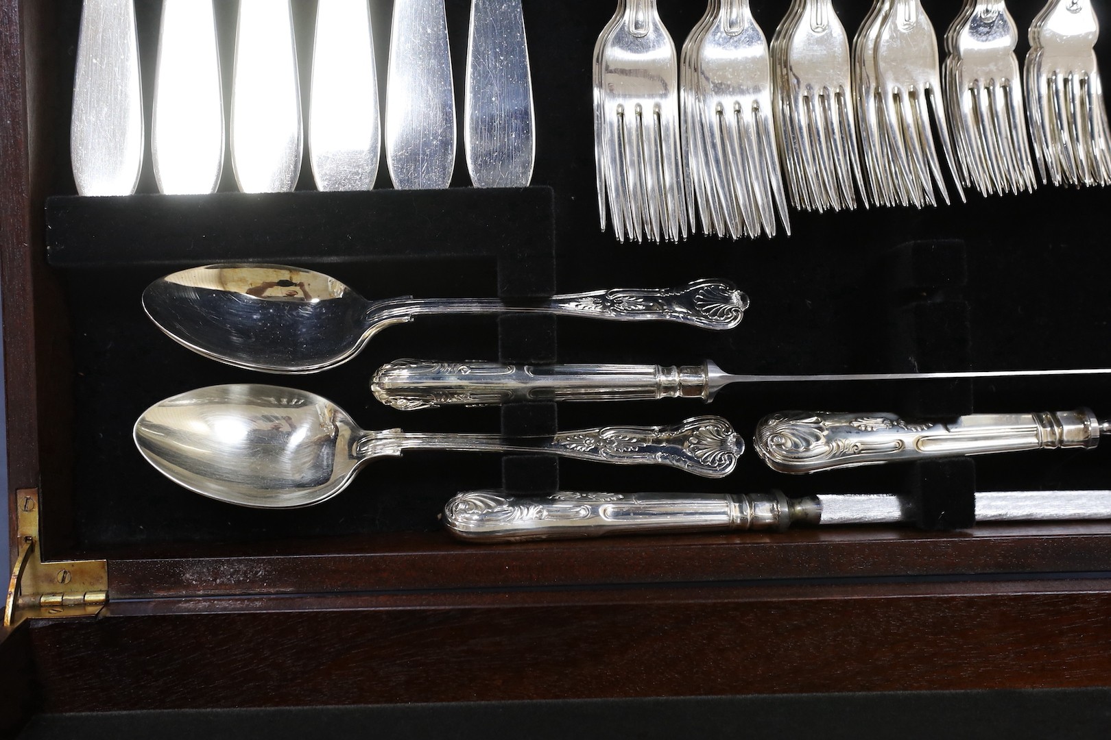 A leather inset canteen of silver plated flatware